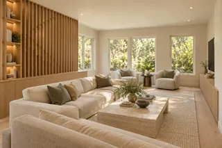 Fulton House — Living room · pale oak, textured linen and a screened stair