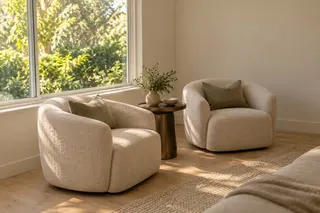 Fulton House — Living room · a quiet reading corner beside the front windows