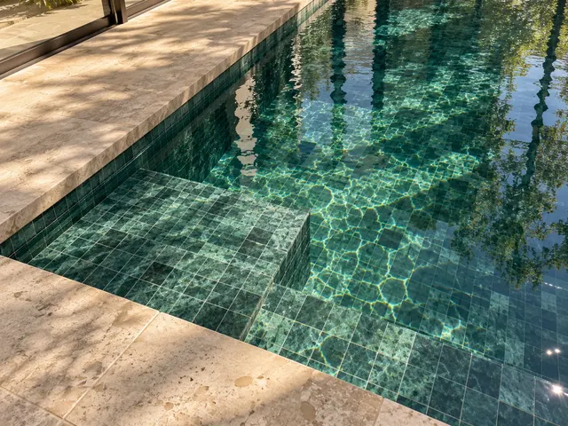 Madinah Family Villa · Exterior · Green mosaic and water detail