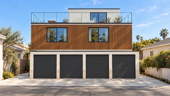 Oliver Court — Rear alley frontage · garage entrances and the garden home above